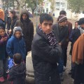 Refugee shelter between trees: the faces of crisis